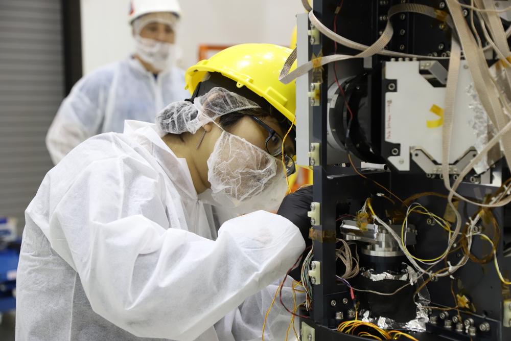 Nguyen installing the cryogenic star tracker (CSTARS-2) into the CIBER-2 payload